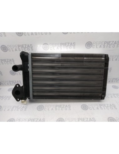 Radiador calefacción Volkswagen Polo II, Audi 50. Valeo 812029.